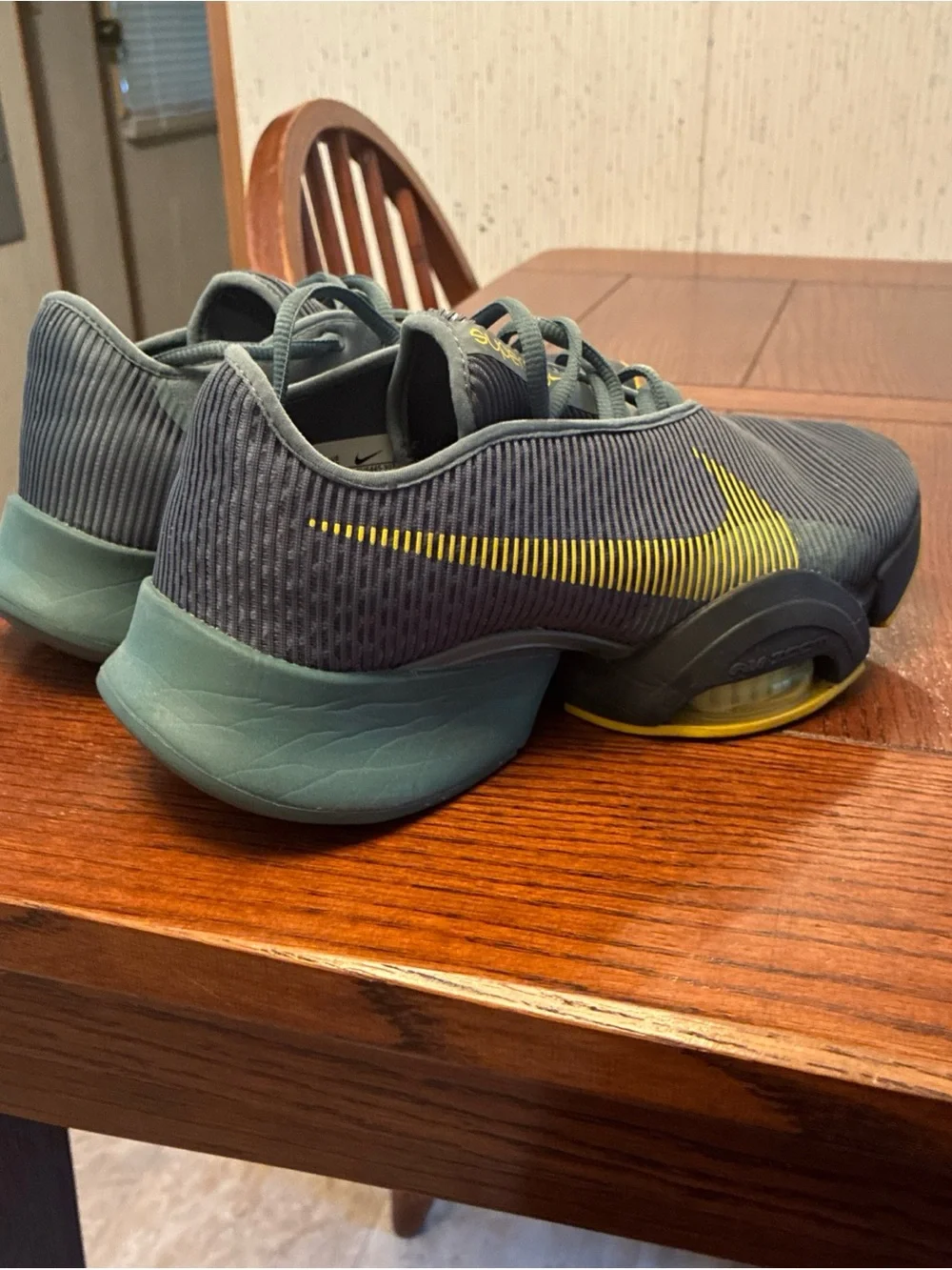 Nike Men’s Gray Athletic Shoes with Yellow Swoosh